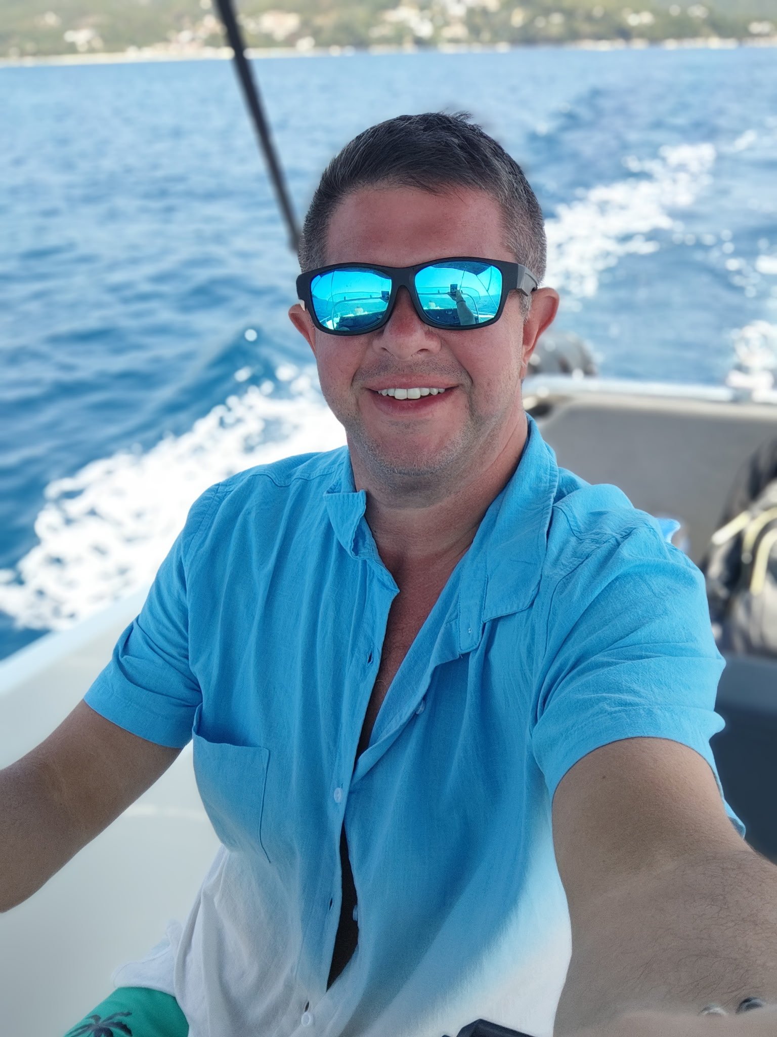 Ryan Britner LPN — Co-founder of Elemental Wellness and Healing, pictured on the water